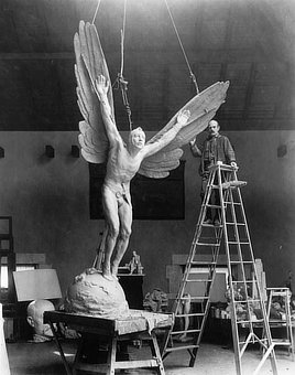 Gutzon Borglum, sculptor, and his statue called Aviator. Photo, 1919.