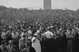 Woman with camera and crowd at the March on Washington. Photo by Warren Leffler, 1963.