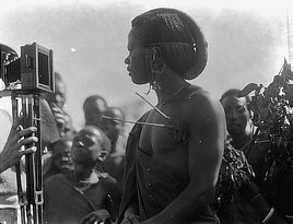 A young Masai interested in the camera, Arusha, Tanzania. Photo by Matson, 1936.