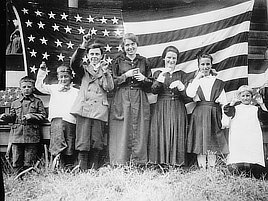 Deaf children of St. Rita’s School, Cincinnati, OH, singing the Star Spangled Banner in sign language. Photo by J.R. Schmidt, 1918