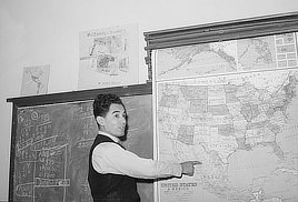School teacher in grade school teaching geography. Concho, Arizona. Photo by Russell Lee, 1940.