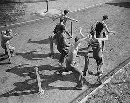 Benjamin Franklin High School, New York, New York. High school boys growing physically fit through exercise. Photo by William Perlitch, 1942