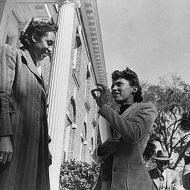 Two teachers having a conversation, Bethune-Cookman College, Daytona Beach, Florida. Photo by Gordon Parks, 1943.
