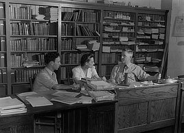 Miss Mae Kelly, director of instruction, with teachers at Randolph Henry High School, Keysville, Virginia. Photo by Philip Bonn, 1943.